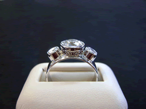 Side view of 3 diamond ring